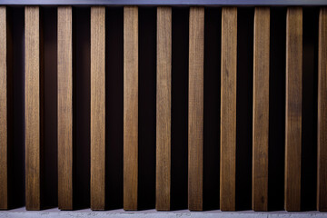 Wooden slatted and screwed timber wall on a black background.