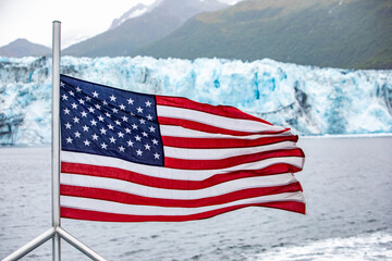 American flag with icy glaciers in the back