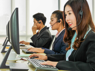 Asian business man working as customer servidce call center in  the office new normal