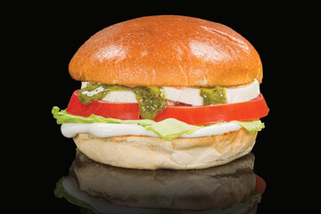 Delicious vegetable burger with cheese, tomatoes and lettuce