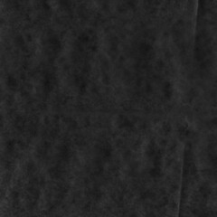 Black vintage and old looking crumpled paper background. Retro cardboard texture. Grunge paper for drawing. Ancient book page. Present wrapping.