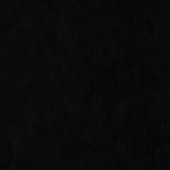 Black vintage and old looking crumpled paper background. Retro cardboard texture. Grunge paper for drawing. Ancient book page. Present wrapping.