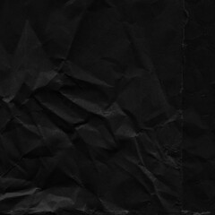 Fototapeta premium Black vintage and old looking crumpled paper background. Retro cardboard texture. Grunge paper for drawing. Ancient book page. Present wrapping.