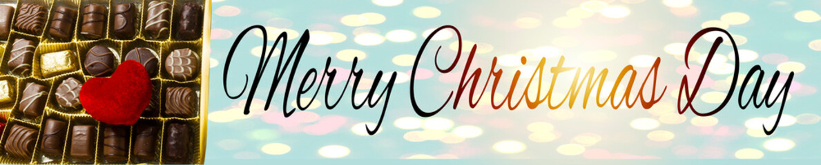 various chocolate in box for valentine's day and heart cotton and merry christmas text with bokeh background