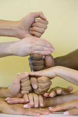 hands of people of different nationalities with different gestures symbolizing diversity and...