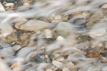 Fototapeta na wymiar water and stones