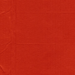 Fototapeta premium A red vintage rough sheet of carton. Recycled environmentally friendly cardboard paper texture. Simple and bright minimalist papercraft background. 