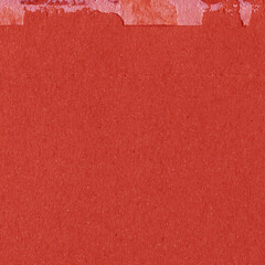 A red vintage rough sheet of carton. Recycled environmentally friendly cardboard paper texture. Simple and bright minimalist papercraft background.

