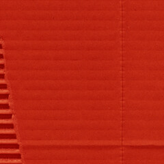 Fototapeta premium A red vintage rough sheet of carton. Recycled environmentally friendly cardboard paper texture. Simple and bright minimalist papercraft background.