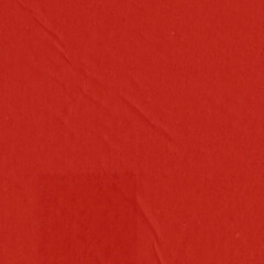 A red vintage rough sheet of carton. Recycled environmentally friendly cardboard paper texture. Simple and bright minimalist papercraft background.