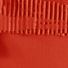 A red vintage rough sheet of carton. Recycled environmentally friendly cardboard paper texture. Simple and bright minimalist papercraft background.