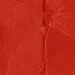 A red vintage rough sheet of carton. Recycled environmentally friendly cardboard paper texture. Simple and bright minimalist papercraft background.