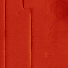 A red vintage rough sheet of carton. Recycled environmentally friendly cardboard paper texture. Simple and bright minimalist papercraft background.