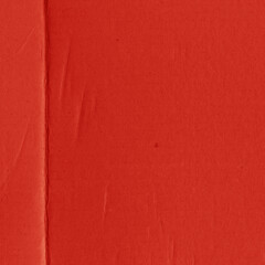 Fototapeta premium A red vintage rough sheet of carton. Recycled environmentally friendly cardboard paper texture. Simple and bright minimalist papercraft background.