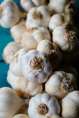garlic bunch on a blue wooden table