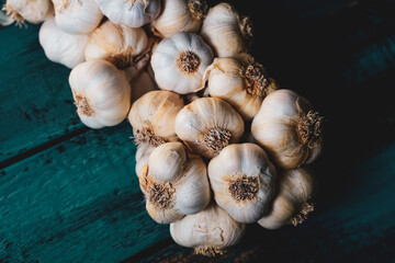 garlic bunch on a blue wooden table