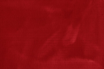 A red vintage rough sheet of carton. Recycled environmentally friendly cardboard paper texture. Simple and bright minimalist papercraft background.