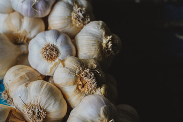 garlic bunch on a blue wooden table