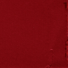 A red vintage rough sheet of carton. Recycled environmentally friendly cardboard paper texture. Simple and bright minimalist papercraft background.