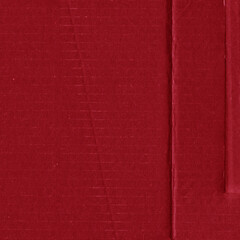 Red vintage rough sheet of carton. Recycled environmentally friendly cardboard paper texture. Simple and bright minimalist papercraft background.