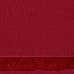 A red vintage rough sheet of carton. Recycled environmentally friendly cardboard paper texture. Simple and bright minimalist papercraft background.