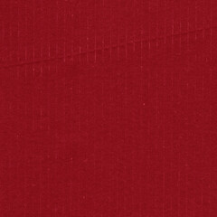 A red vintage rough sheet of carton. Recycled environmentally friendly cardboard paper texture. Simple and bright minimalist papercraft background.