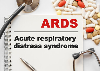 Page in notebook with ARDS Acute respiratory distress syndrome. on white background with...