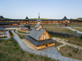 Fototapeta na wymiar Aerial view of the old wooden medieval Christian church