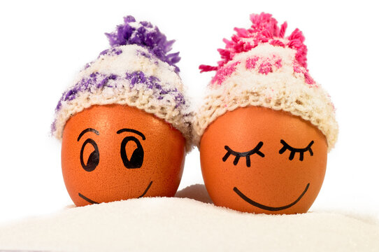 funny lovely eggs in winter hats and sugar like a snow