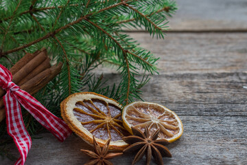Mulled wine ingredients on a wooden background. Christmas card. Happy new year. Space for text.