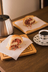 Lunch scene with stuffed bread and coffee