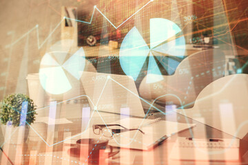 Double exposure of stock market graph drawing and office interior background. Concept of financial analysis.