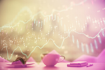 Double exposure of forex chart over coffee cup background in office. Concept of financial analysis...