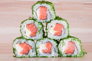 Maki Sushi on wooden background
