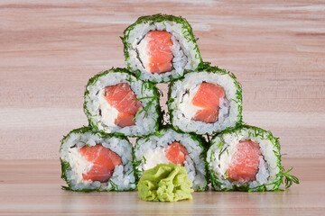 Maki Sushi on wooden background