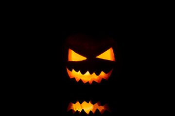 Jack o Lantern on a black background.