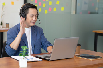 Asian Startup business man meeting with video Conference in office.