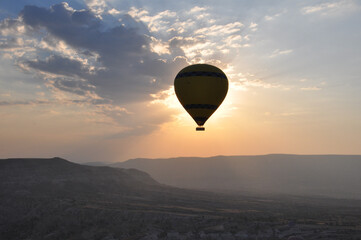 Silhouette of hot air balloons at sunrise over Cappadocia, Turkey