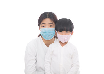 Mom and daughter wearing masks in front of white background