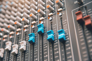 Close-up audio mixer in studio workplace for sound recording equipment and sound system instrument concept.