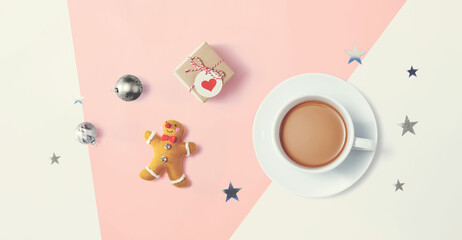 Christmas ornaments with a cup of coffee - flat lay