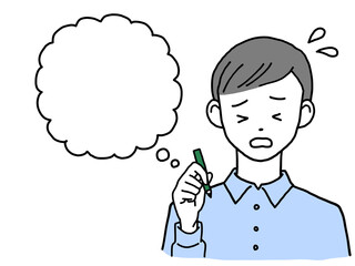 困った顔でペンを持つ若い男性  吹き出し