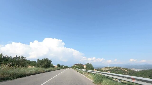 Mountain road drivel apse at the summer sunny day, timelapse pov