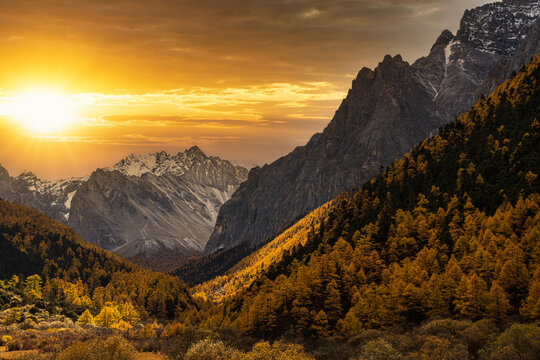 Scene of sunset at The mountain in autumn season in yading nature reserve, Daocheng County, southwest of Sichuan Province, China.travel destination and tourism,famous place and landmark concept.