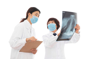 Medical experts and interns are studying lung X-rays