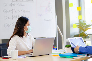 Group of senior businesspeople with hygiene protective face mask in meeting 