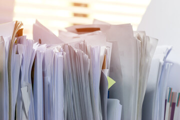 Unfinished Report of papers document folder with black clippaper. Pile a lot of agreements report...
