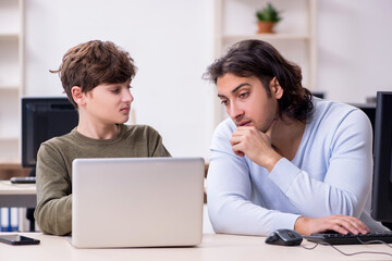 Father and son in it concept