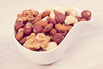 Different nuts and almonds containing vitamin, minerals and acids