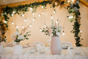 wedding decor on the table in the restaurant